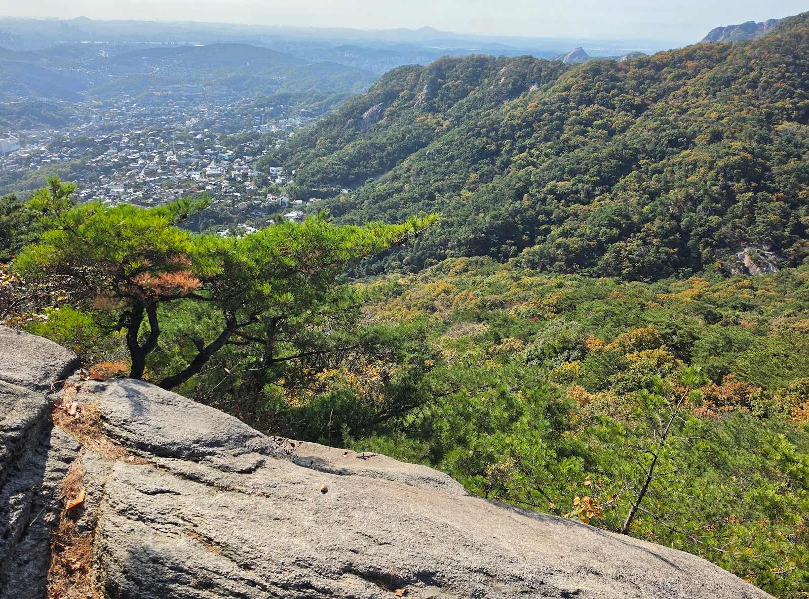 View from Bukhansan's Hyeongjebong ridge down onto the rooftops of Pyeongchang-dong